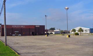 Photo: view from Expressway of Hall parking lot, Bingo Hall, & Annex (R S V L offices & warehouse complex).